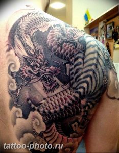 фото тату тигр и дракон 07.12.2018 №079 - tattoo tiger and dragon - tattoo-photo.ru